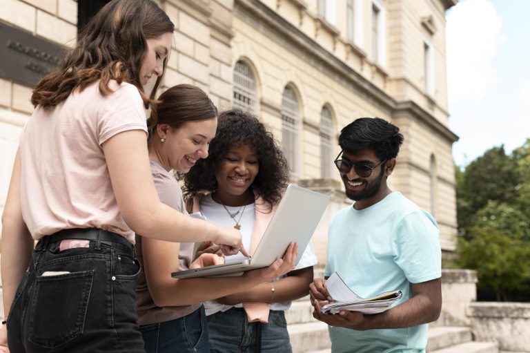 colleagues studying together front their college scaled